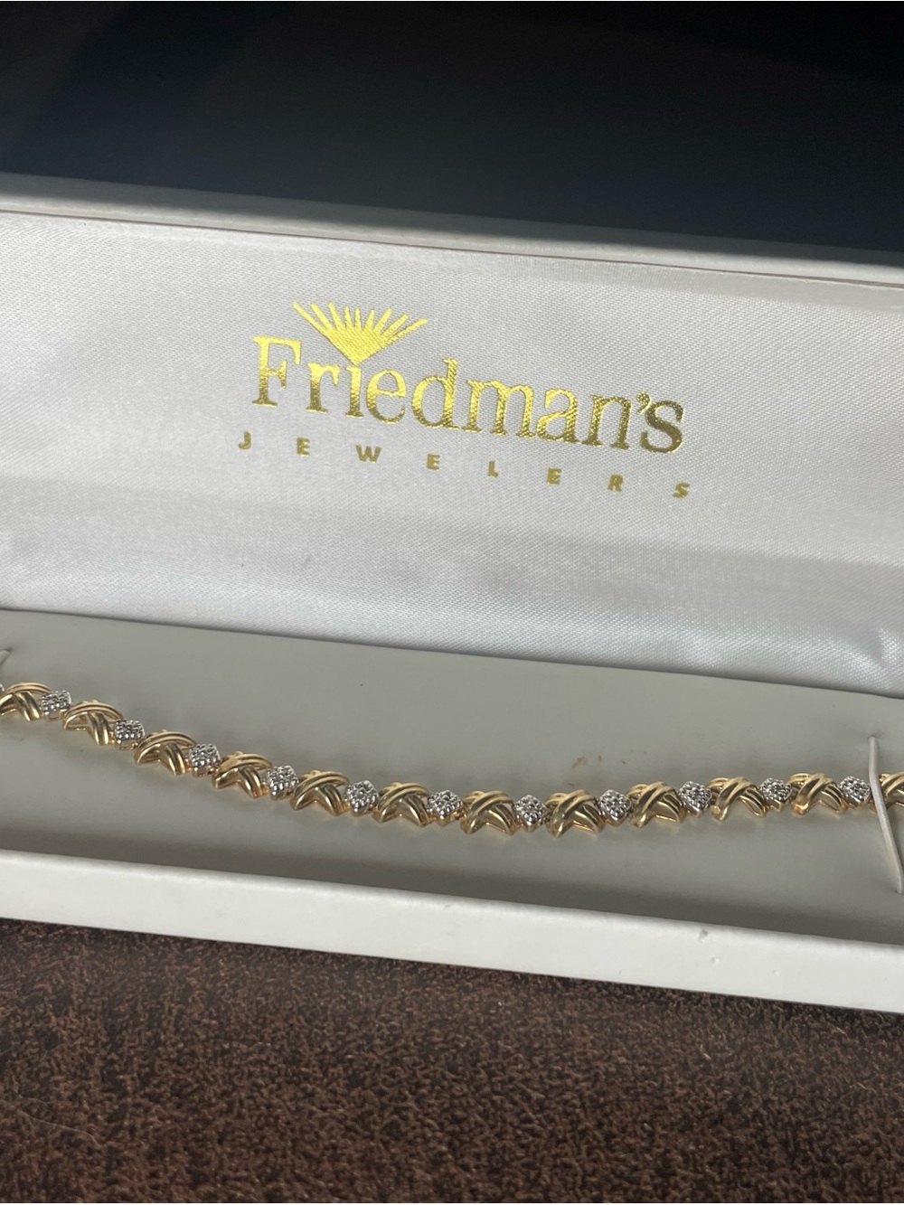 Vintage Friedmans Hugs and Kisses Tennis Bracelet 10 Kt with Diamonds